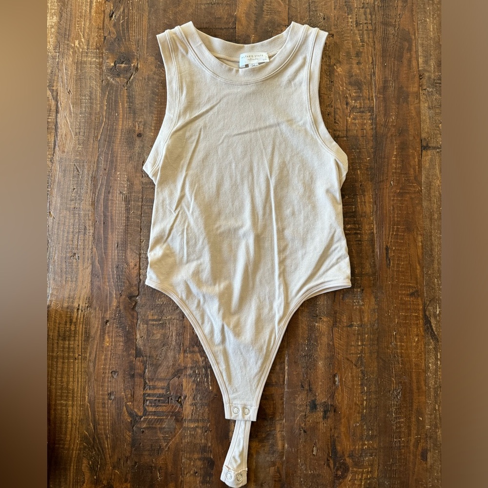 Altar’d State sleeveless bodysuit in light beige